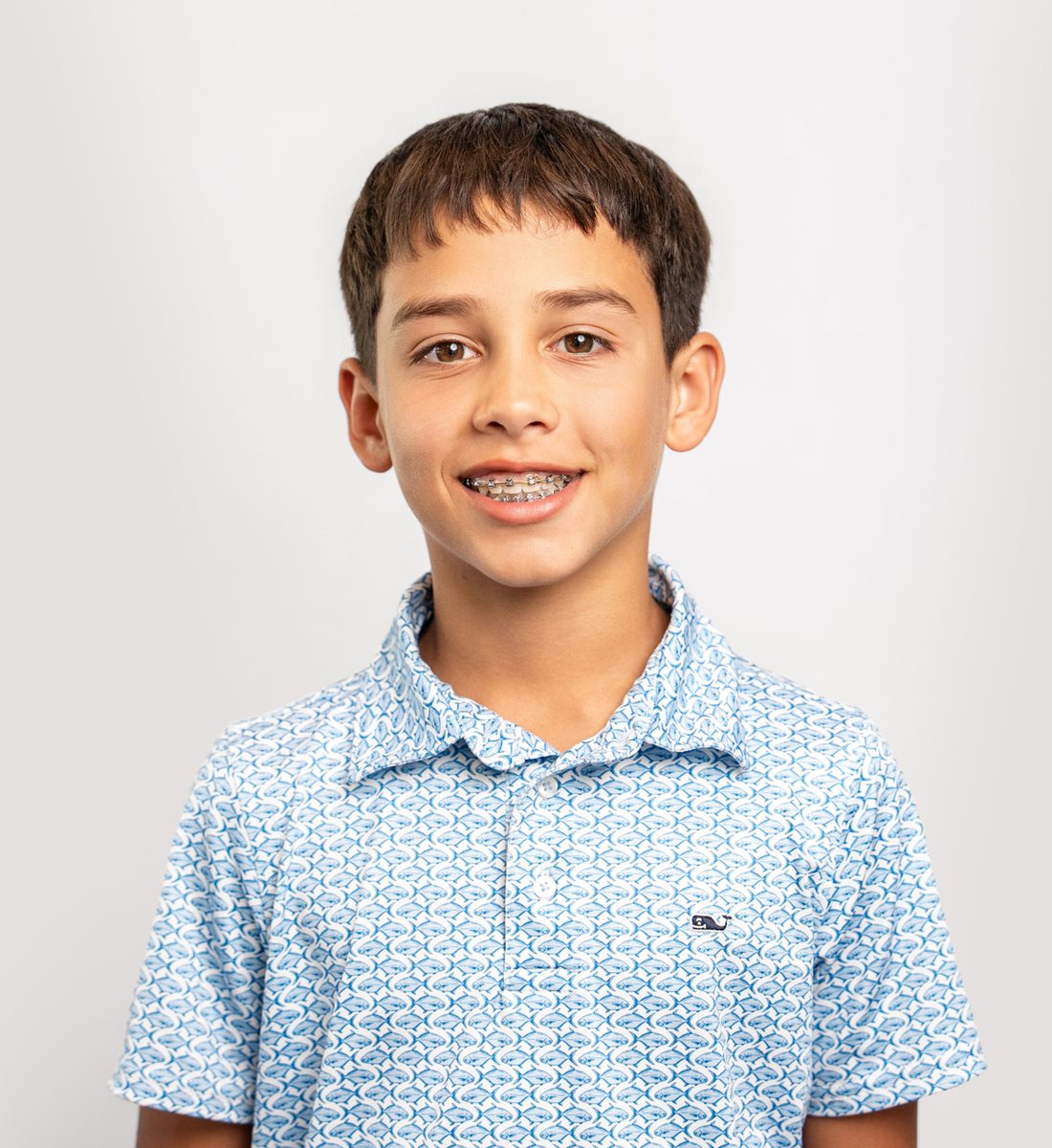 Young patient with braces smiling