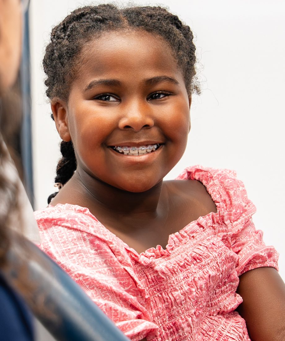 Young patient smiling in the treatment chair