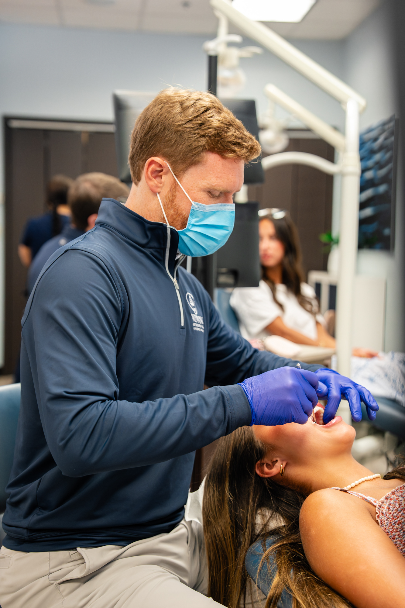 Orthodontist adjusting a patient's braces at the Beaufort office
