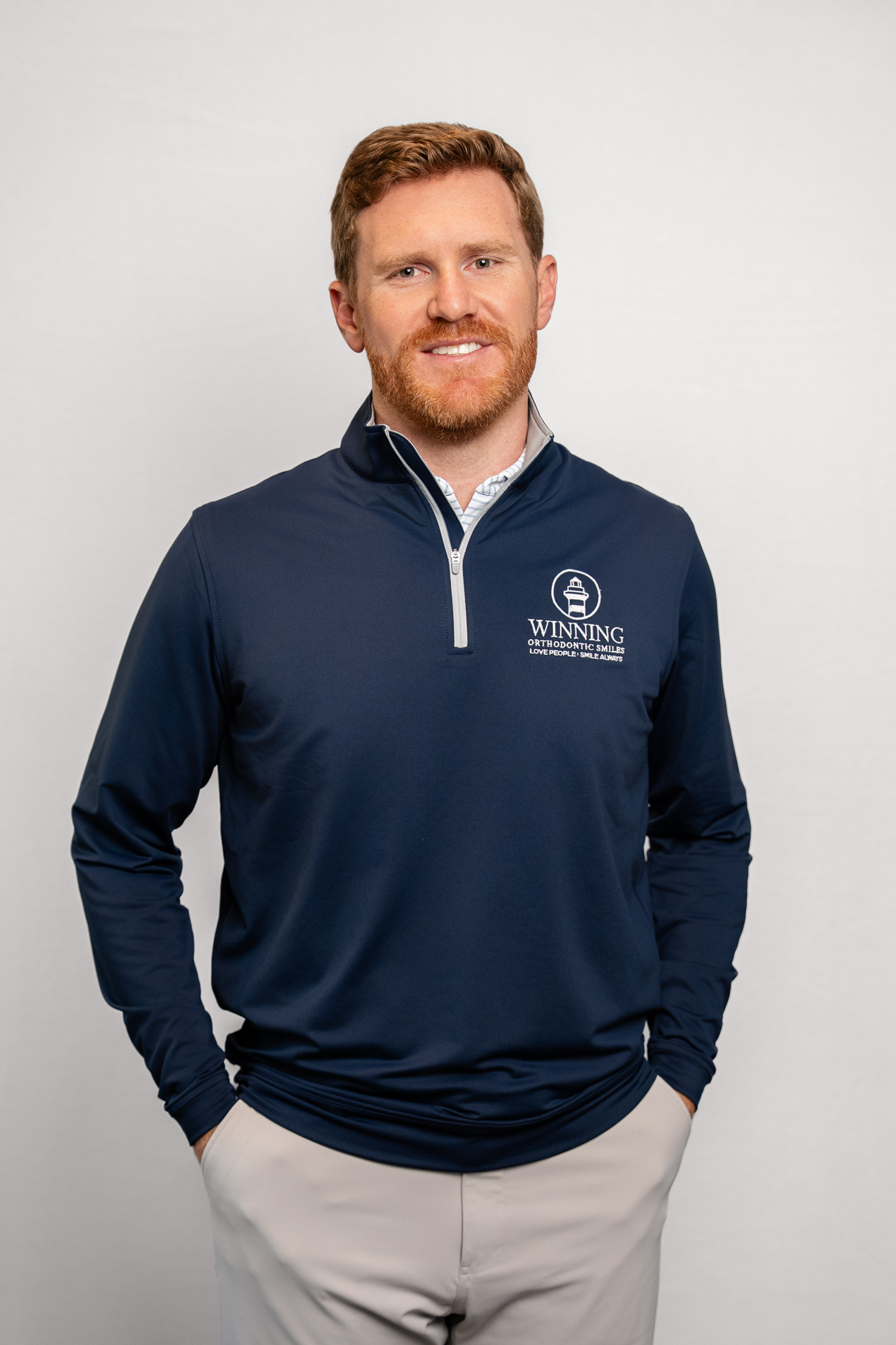 Dr. Gavin Fox in a Winning Orthodontic Smiles quarter-zip pullover